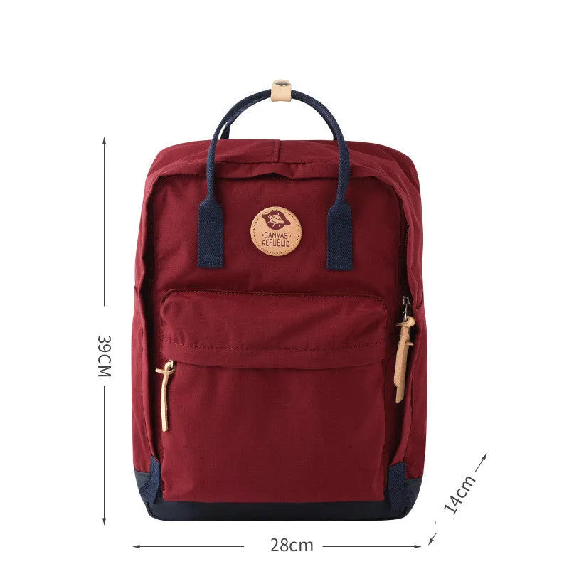 Polyester backpack with water repellent finish, zipper closure, and computer pocket, available in hit colours