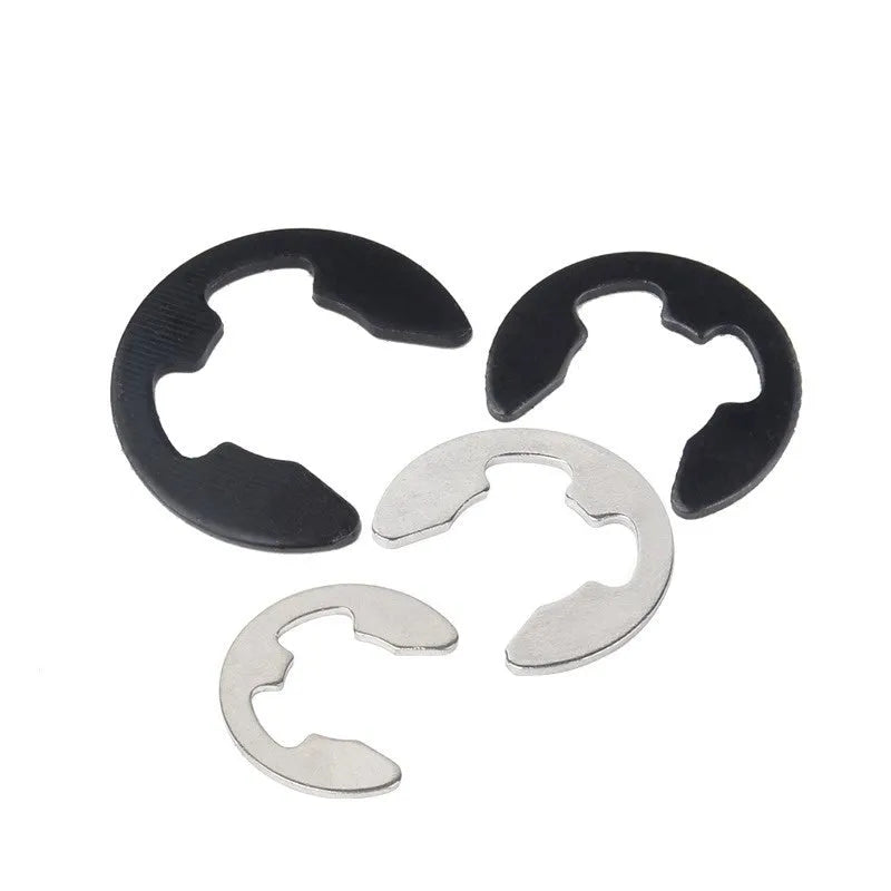 E-type snap spring M4 size in natural colour 304 stainless steel, shown isolated on white background