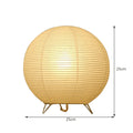 White rice paper plug-in table lamp with E14 bulb socket on wooden desk