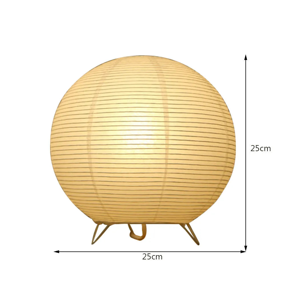 White rice paper plug-in table lamp with E14 bulb socket on wooden desk