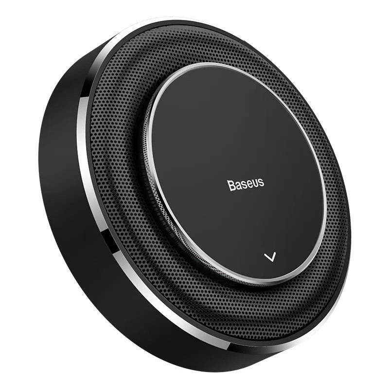 Black aluminium alloy round car perfume seat with aromatherapy tablets on a car seat.