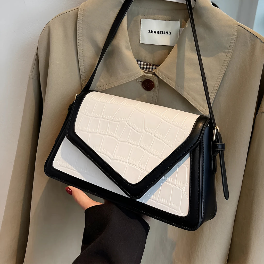 Women's square shoulder bag in PU leather with urban simplicity style showing horizontal shape