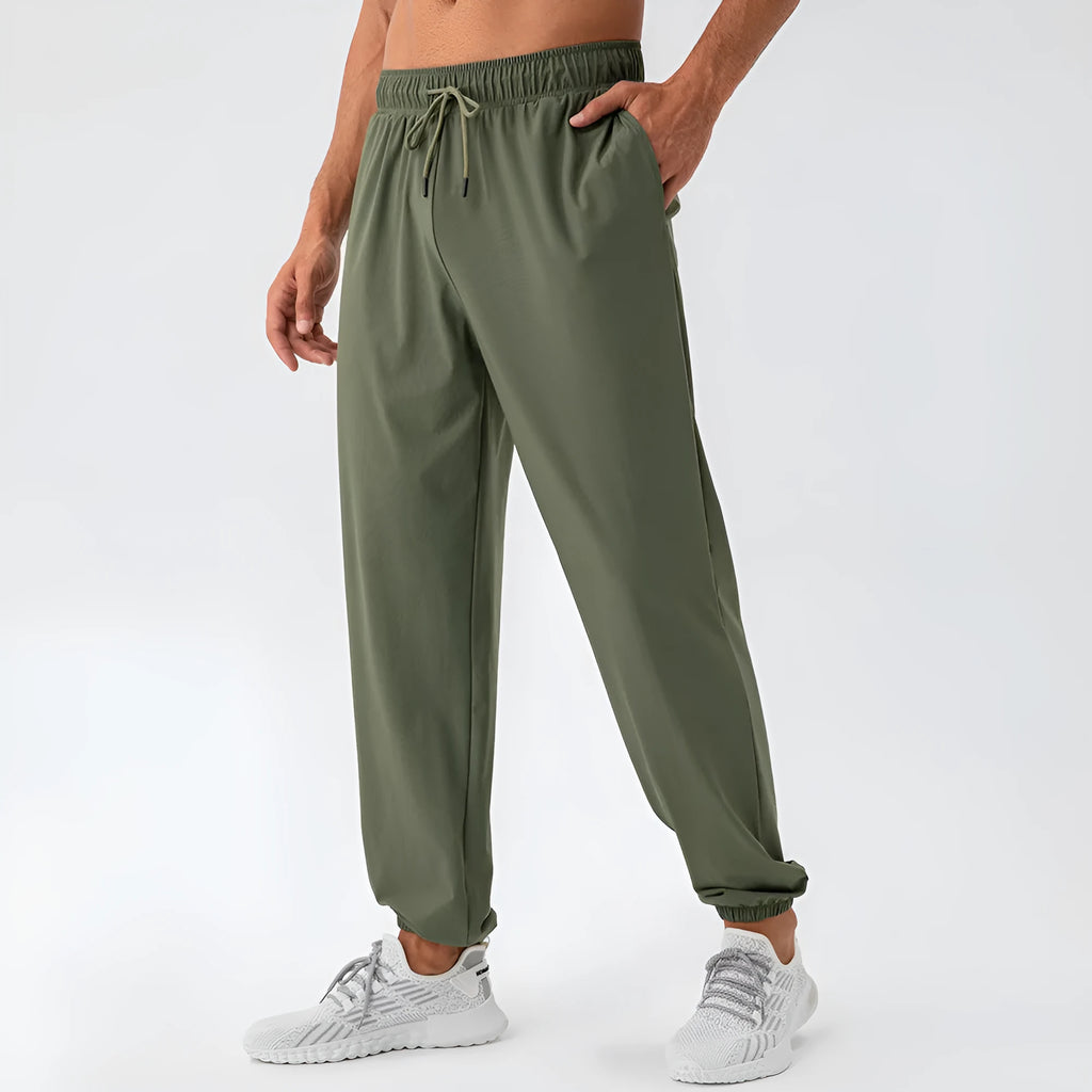 Men's nylon cool feeling loose track pants, quick-drying, black colour, running fitness training trousers