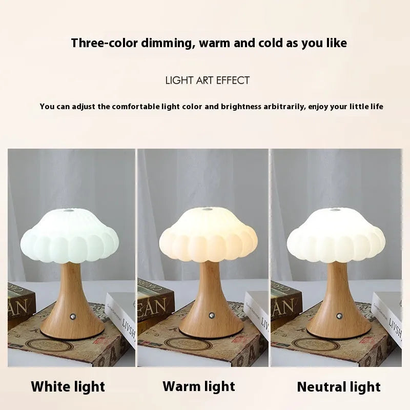 Decorative mushroom-shaped touch lamp in wood grain colour on a tabletop.