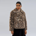 Women's leopard print coat with a buckle lapel front, shown in street fashion style