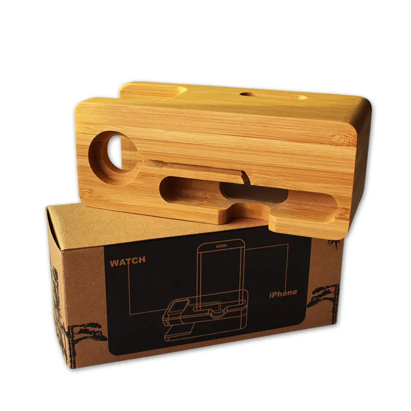 Bamboo desk stand holding a watch and smartphone on an office desk