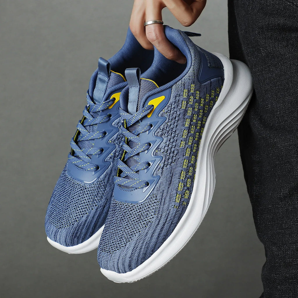Women's Lavender Purple Flyknit running shoes with mesh detailing and a striped pattern on a white background.