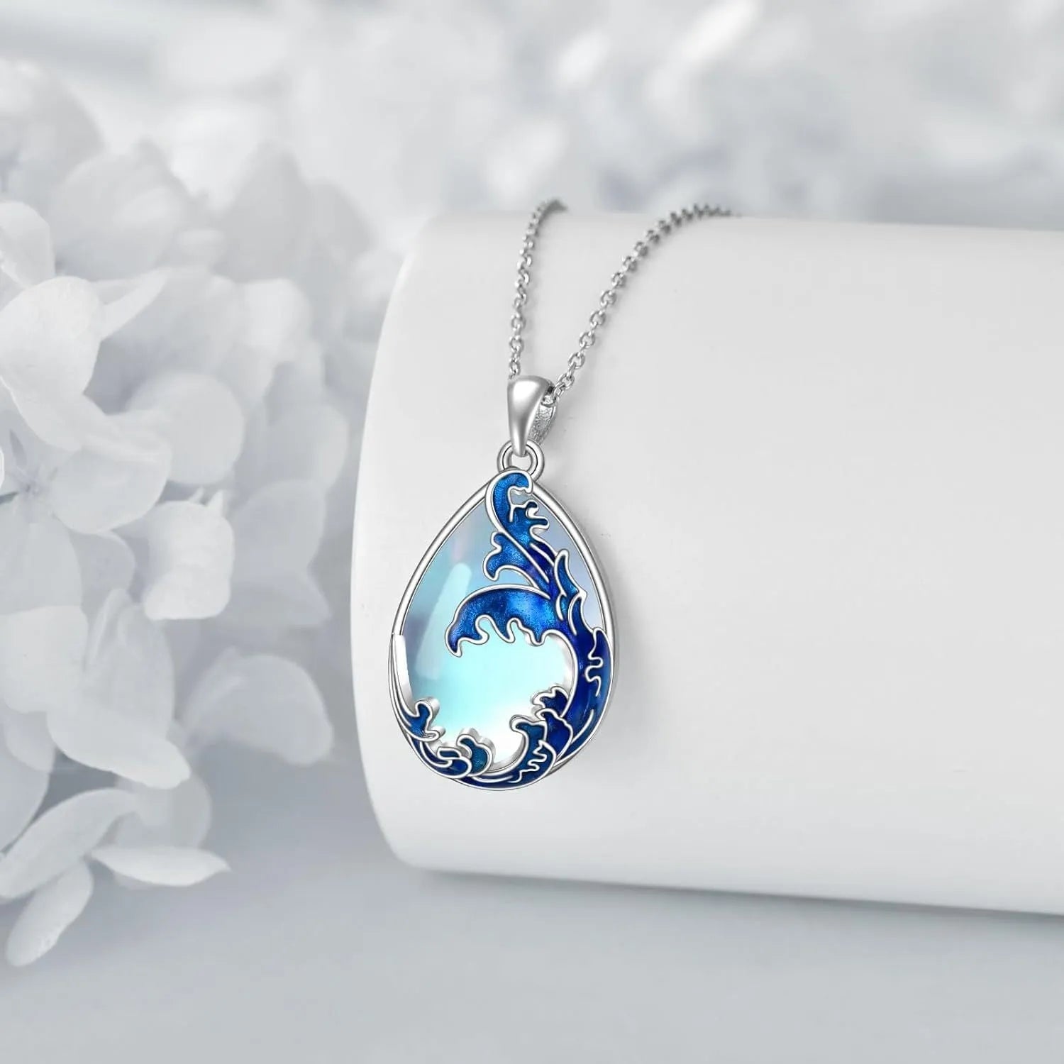 Blue heart-shaped alloy pendant on a women's necklace.