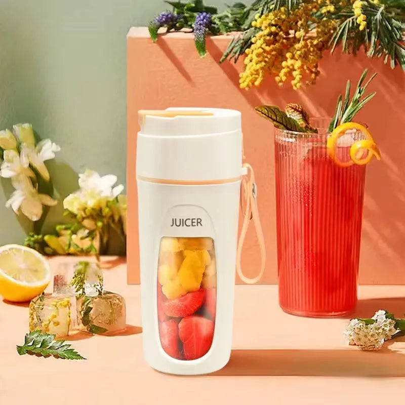 Portable USB charging blender with borosilicate glass cup in grass green, light purple and fresh orange colours