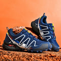 Men's grey orange synthetic leather casual shoes with mesh lining and a rubber sole.