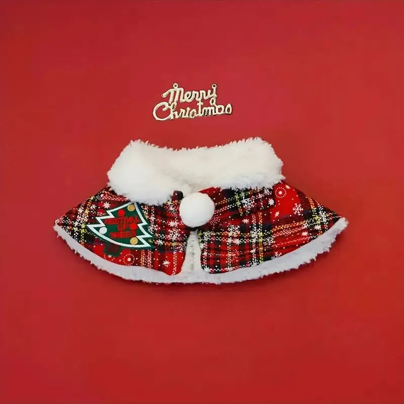 Red background dog scarf with bell pattern draped on a small dog's back for Christmas.