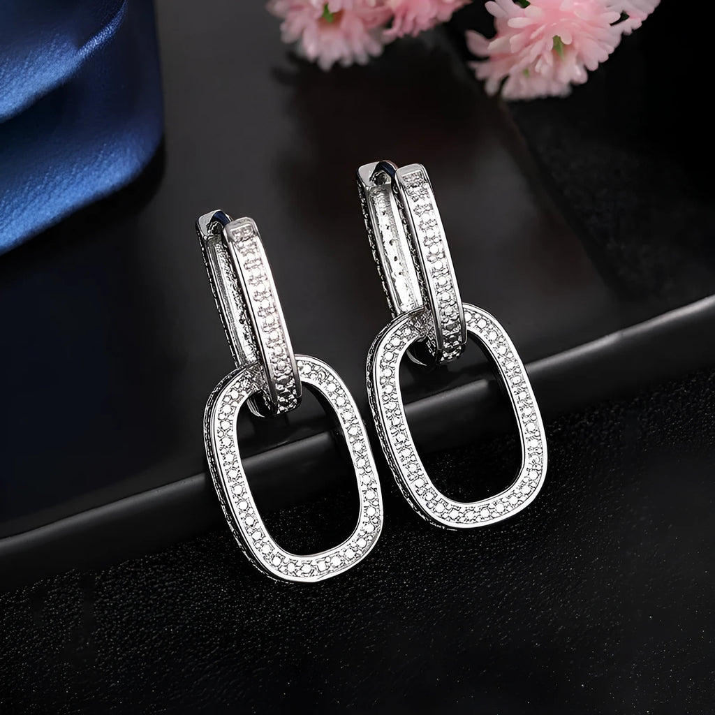 U-shaped geometric copper earrings for women with inlaid zircon, shown in white gold colour and yellow gold colour options.