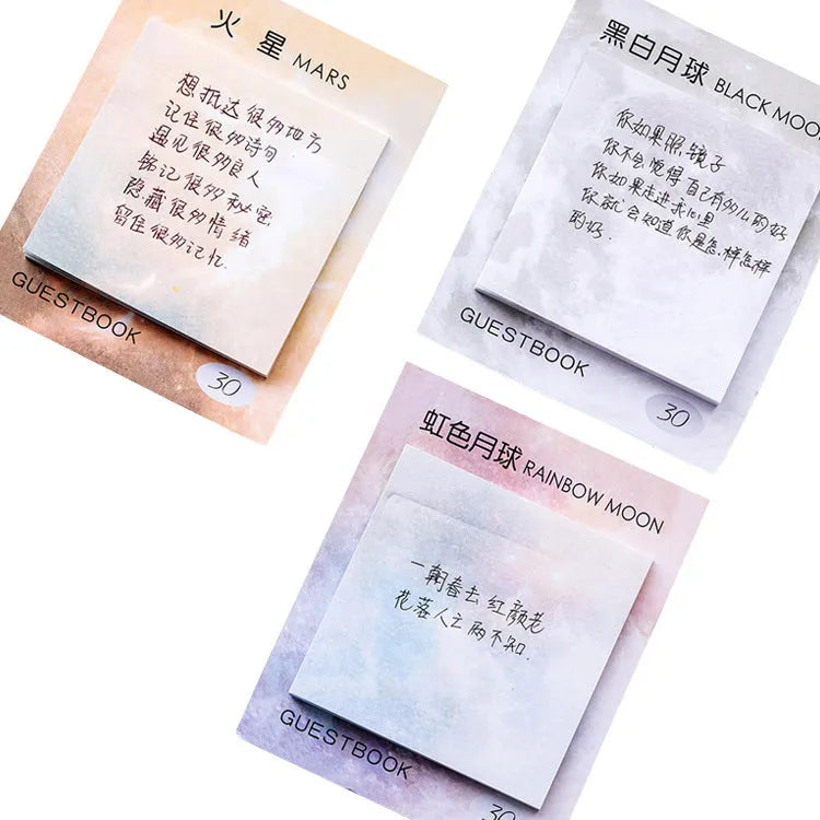 Square planet sticky note pad showing oil painting designs of Earth and other planets.