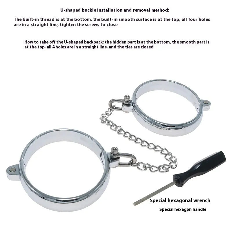 Silver zinc alloy handcuffs and footcuffs set for adults on a dark background
