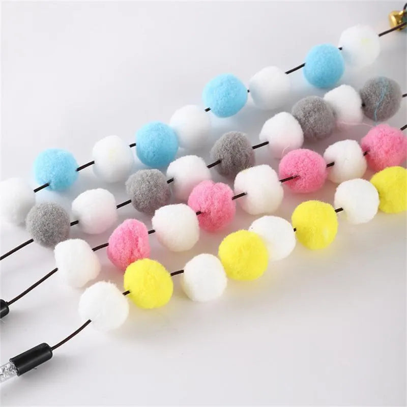 Acrylic pompon cat teaser stick with feather attachments and bell, 31cm long in multiple colours