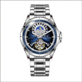 Silver and blue men's automatic mechanical watch with stainless steel strap on a wrist