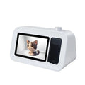 White holographic lyric bluetooth speaker with 5.1 channel sound on a desk