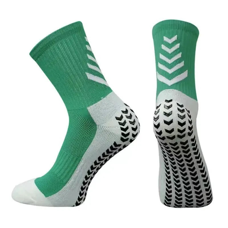Men's patterned athletic sock in mid-calf length, showing non-slip silicone heel grip.