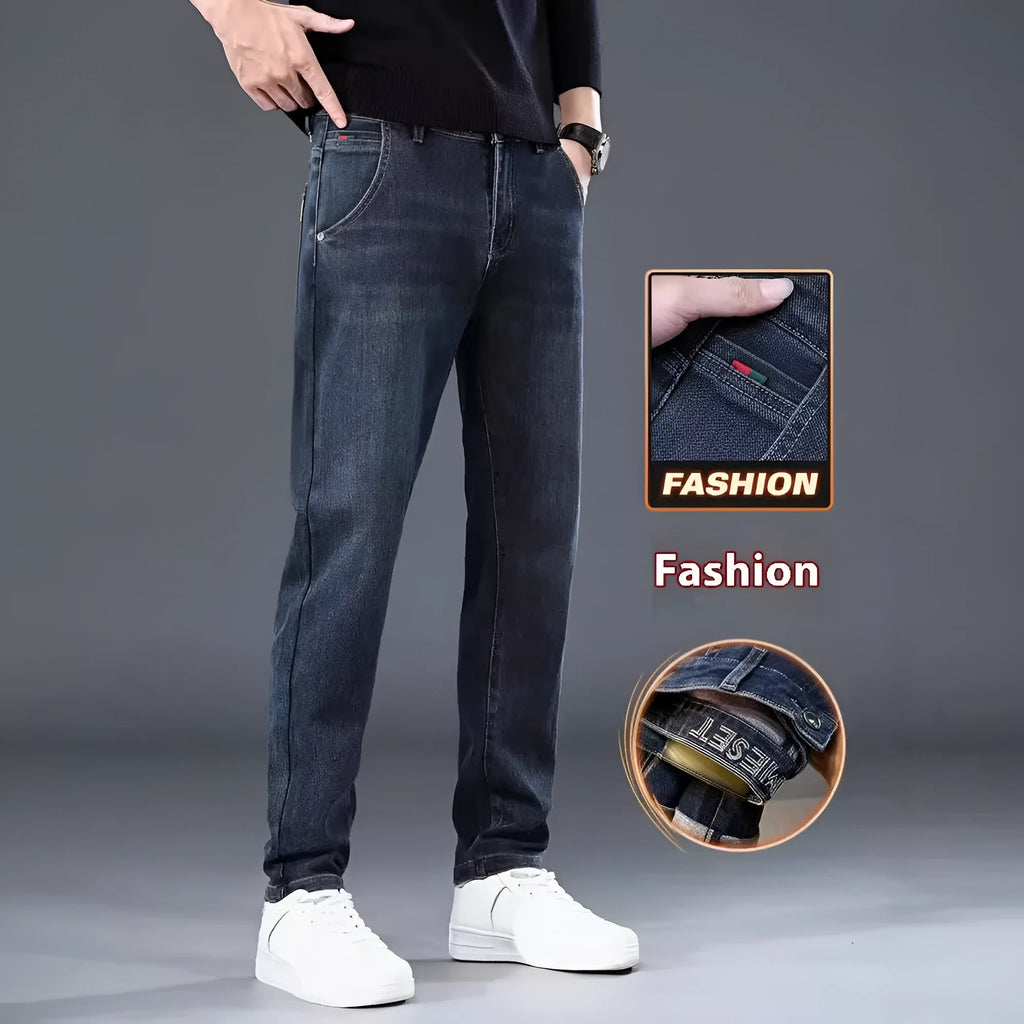Blue grey slim straight casual trousers on a hanger, showing mid waist and straight leg design.