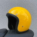 Cement Grey retro open-face motorcycle helmet with a smooth glass fibre shell on a plain background.