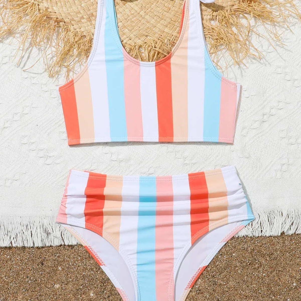 Girls' plaid print swimsuit briefs with polyester lining shown in multiple colour options