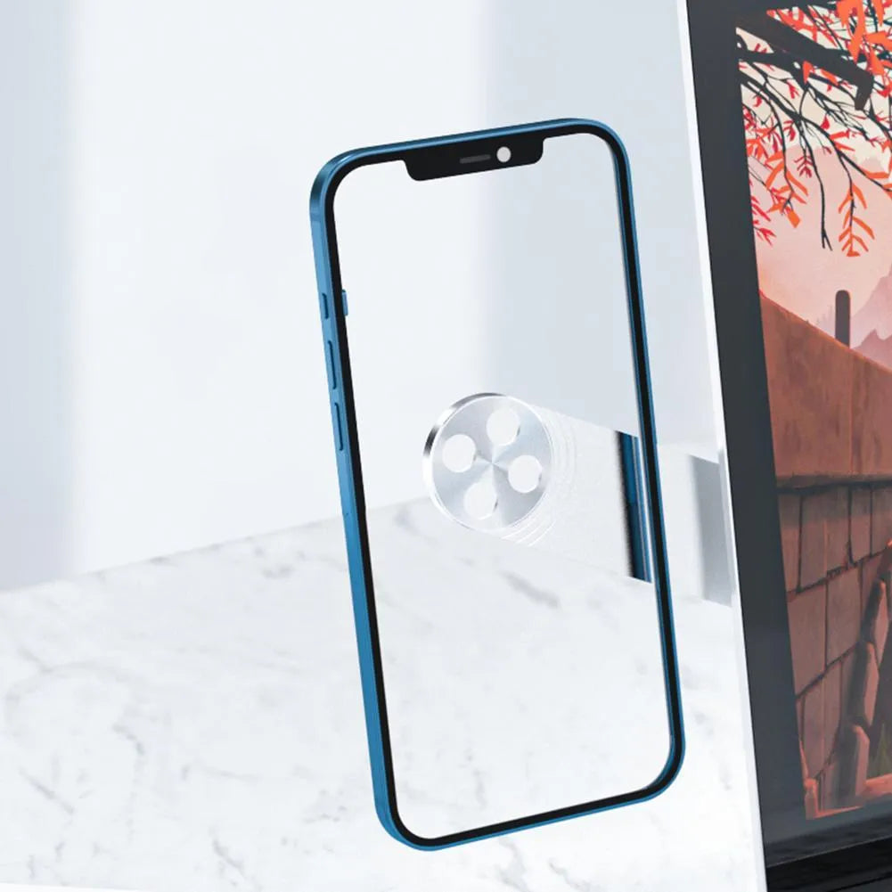 Black aluminium magnetic phone holder clipped to side of a silver laptop.