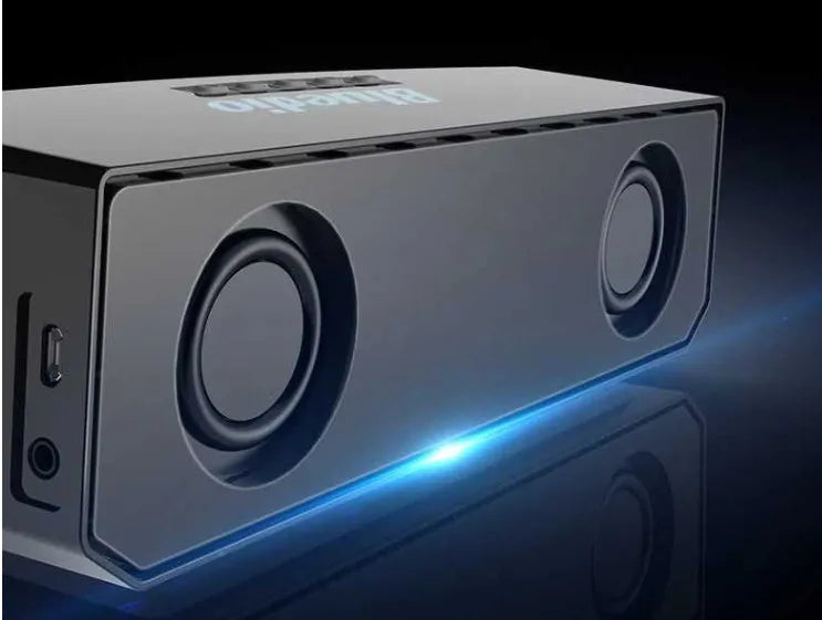 Black BS-6 Google Assistant Bluetooth smart speaker on a surface, showing its compact rectangular design.
