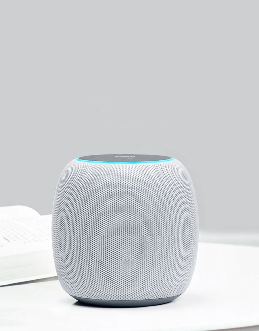 Compact circular AI smart speaker with six-microphone array for voice control