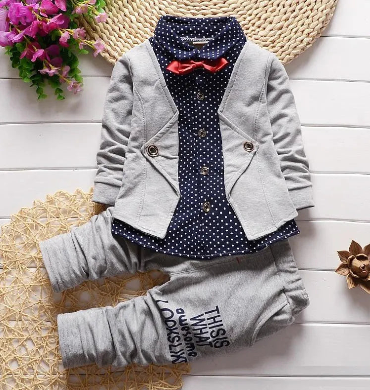 Casual blue kids sport suit set with short sleeves and elasticated waist shorts on a hanger