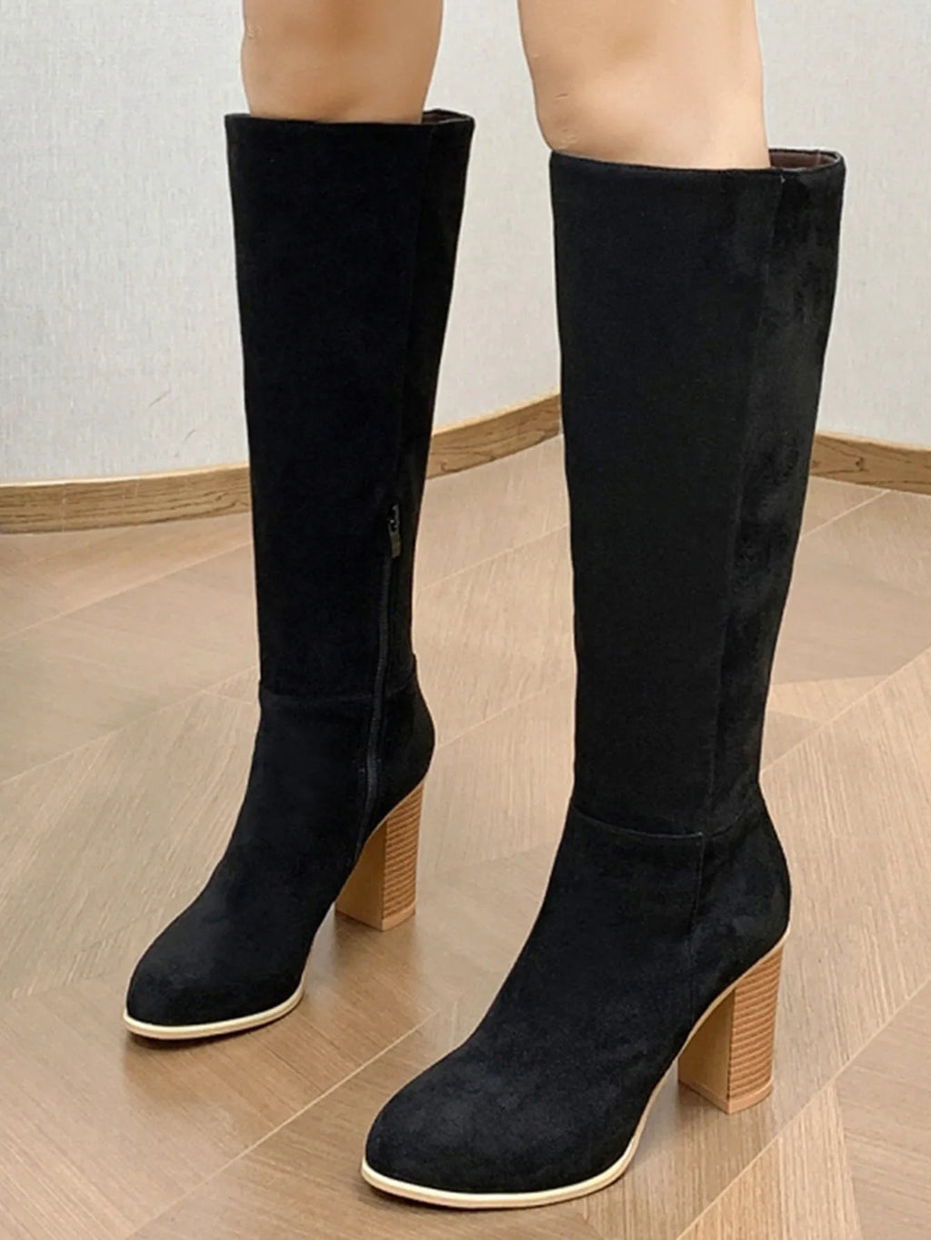 Women's square toe high heel boots in black and dark brown colours, showing artificial PU upper material