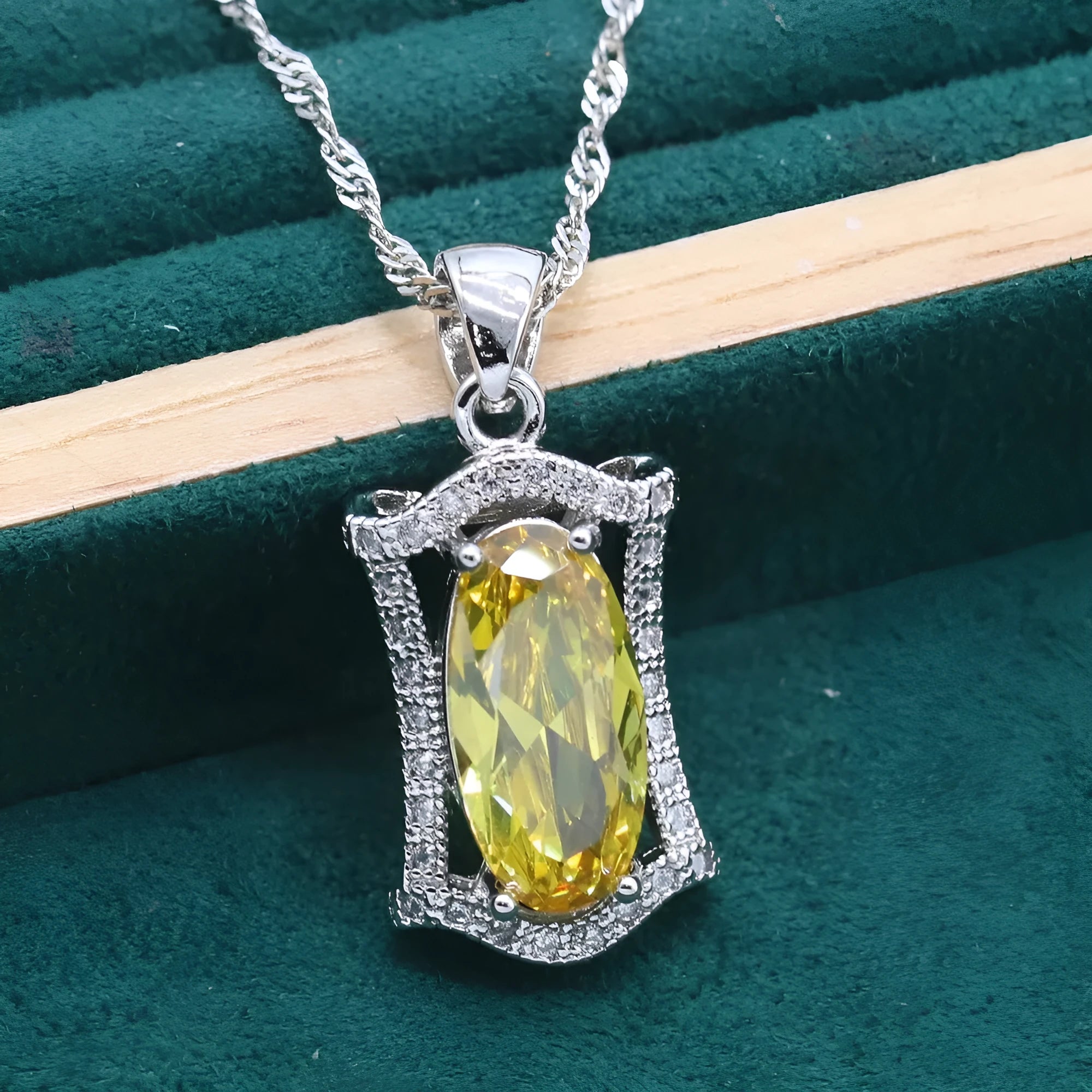 Anti-allergy alloy zircon jewellery set showing necklace, earrings, ring and bracelet in yellow or olive colours