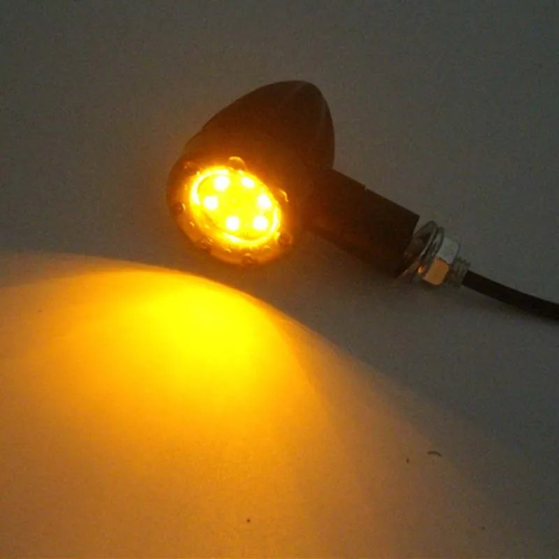 Pair of black 6LED motorcycle turn signals with smoke smoke cover and 8mm screw mount
