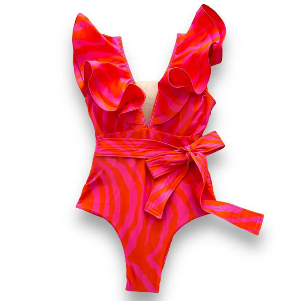 Women's printed one-piece swimsuit with double shoulder straps and ruffled mesh detail on a deep V-neck.