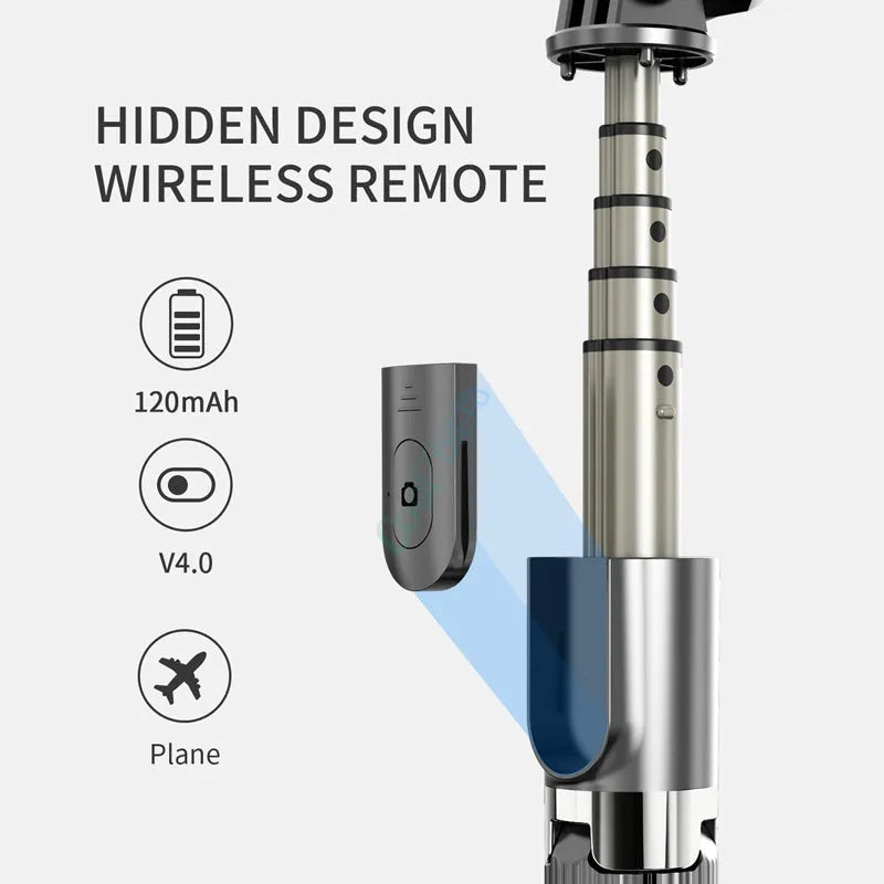 Black aluminium iPhone tripod selfie stick extended to 700mm on a table.