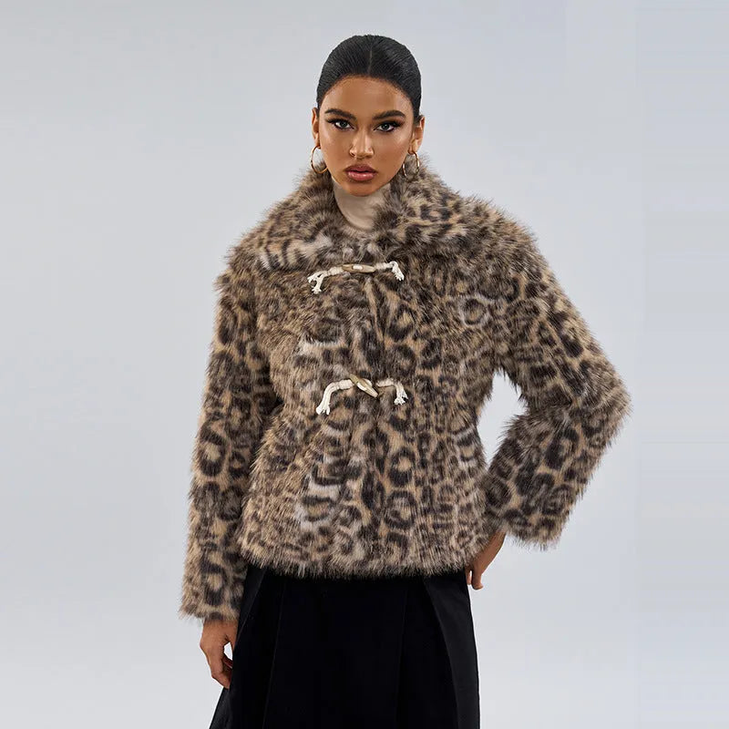 Women's leopard print coat with a buckle lapel front, shown in street fashion style