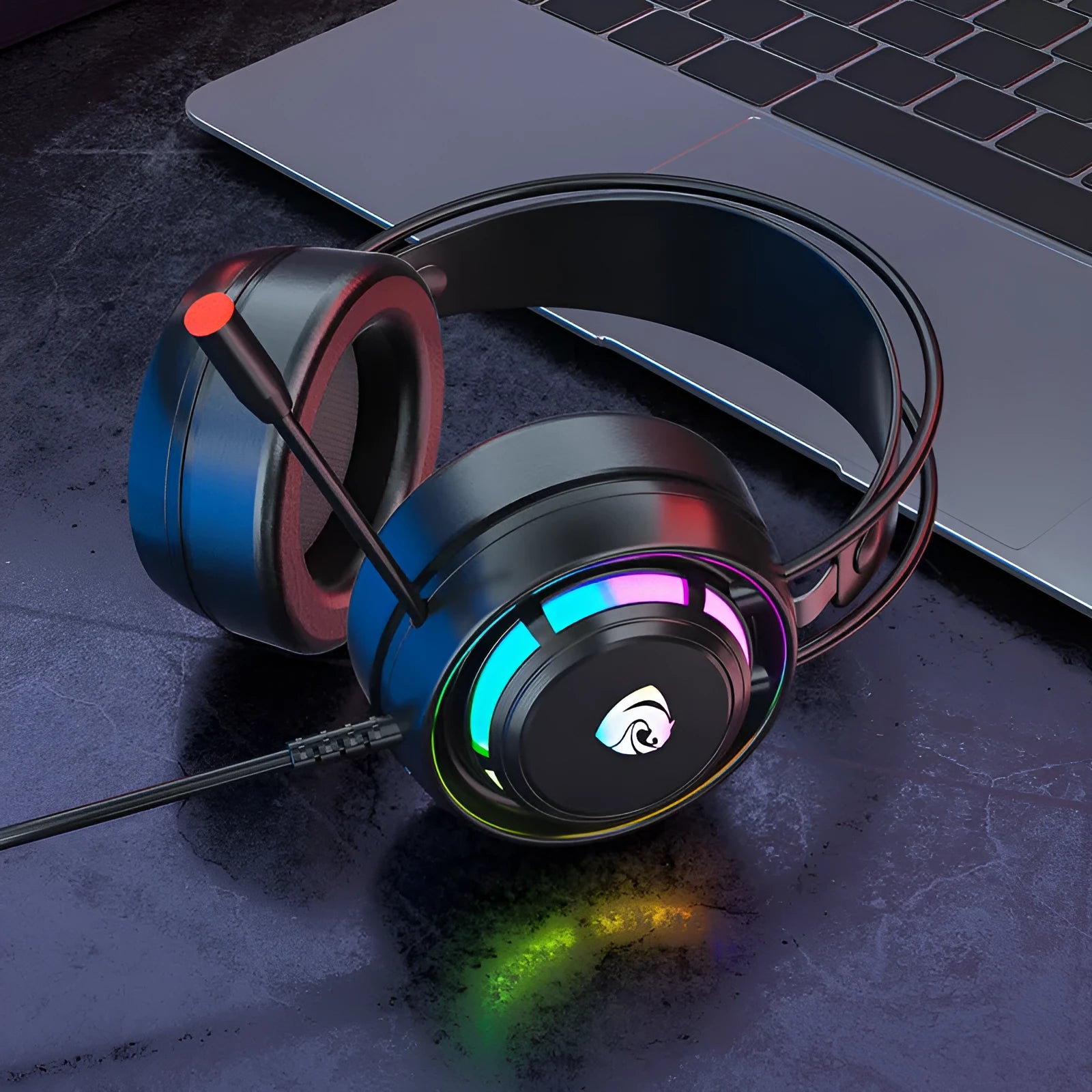 Black wired over-ear gaming headphones with a microphone and a long cable.