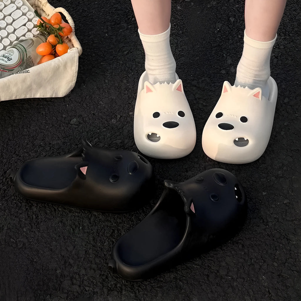 White and black women's EVA puppy slippers with toe cap sandal design showing injection moulded soles