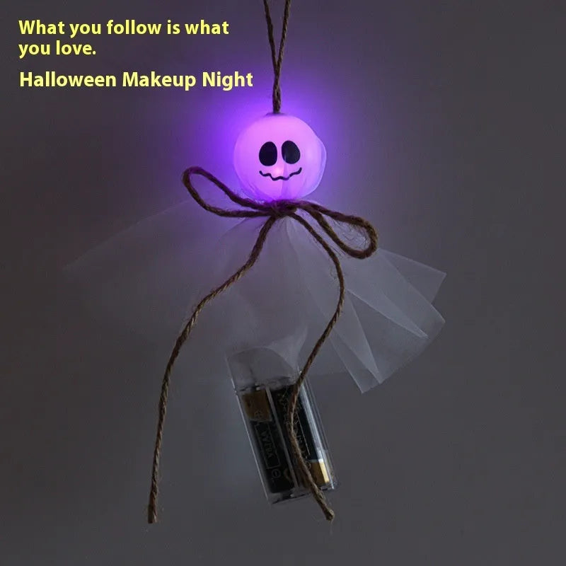 Halloween ghost-themed LED lighting chain with battery box, showing colourful lights on a PVC string.