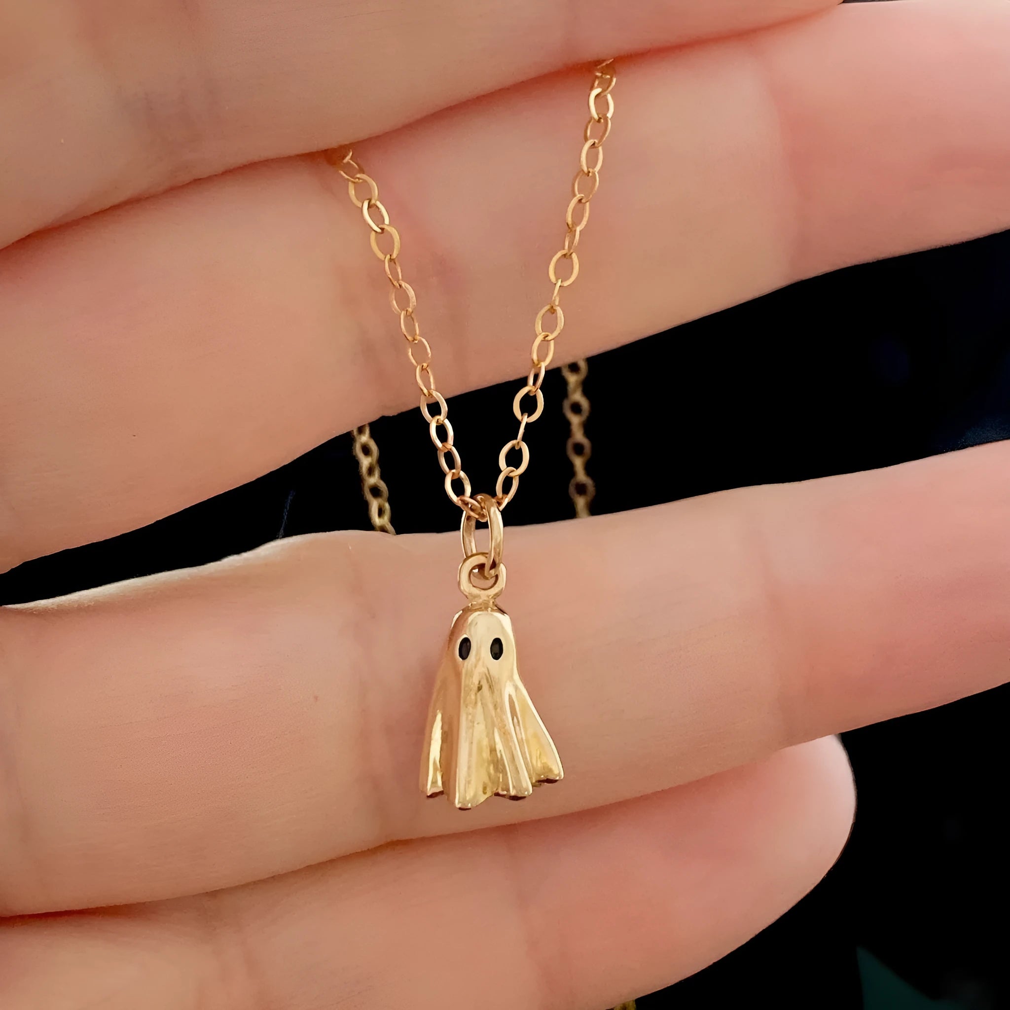 Ghost design pendant necklace on a twisted stainless steel chain with titanium steel pendant.