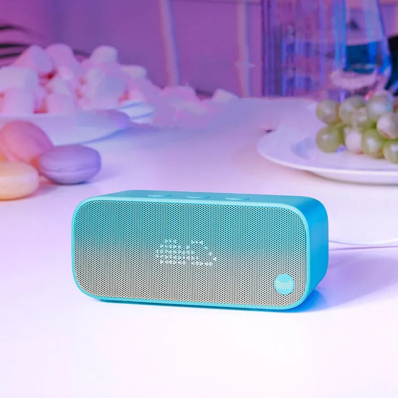 Elf Sugar Cube AI smart WiFi speaker in blue, green, red or white colours with bookshelf design