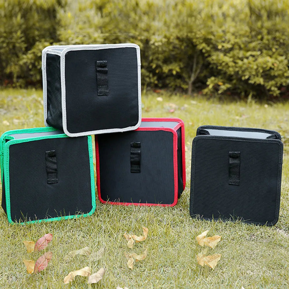 Foldable Oxford car wastebasket 22x22x15cm hanging from car seat with snap closures
