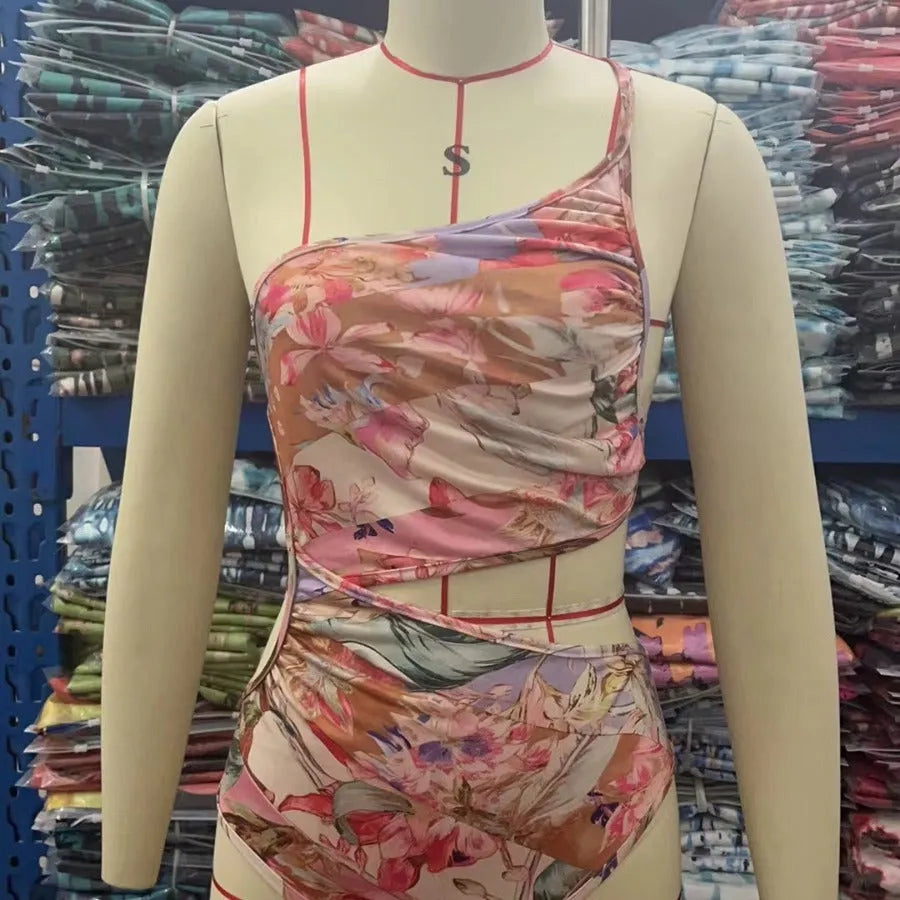 Women's rose gold patterned swimsuit in polyester fabric showing front design