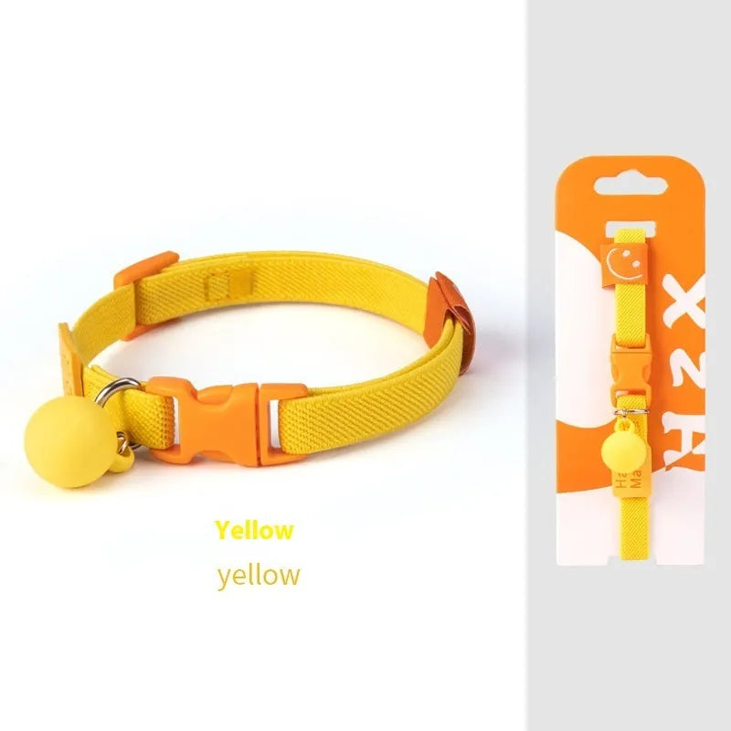 A stretchy, solid-colour polyester dog collar for small breeds, shown in sky blue, adjustable from 22 to 32 centimetres.