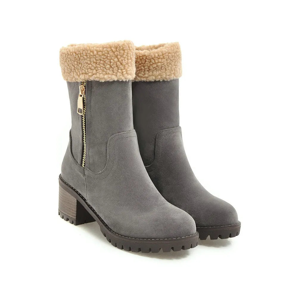 A pair of adult snow boots with plush lining, shown in one of the available colours: black, grey, green, or orange.