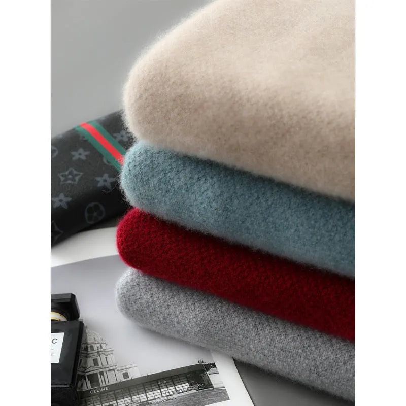 Sheep wool half-zip knitted pullover sweater in slim fit on a hanger.
