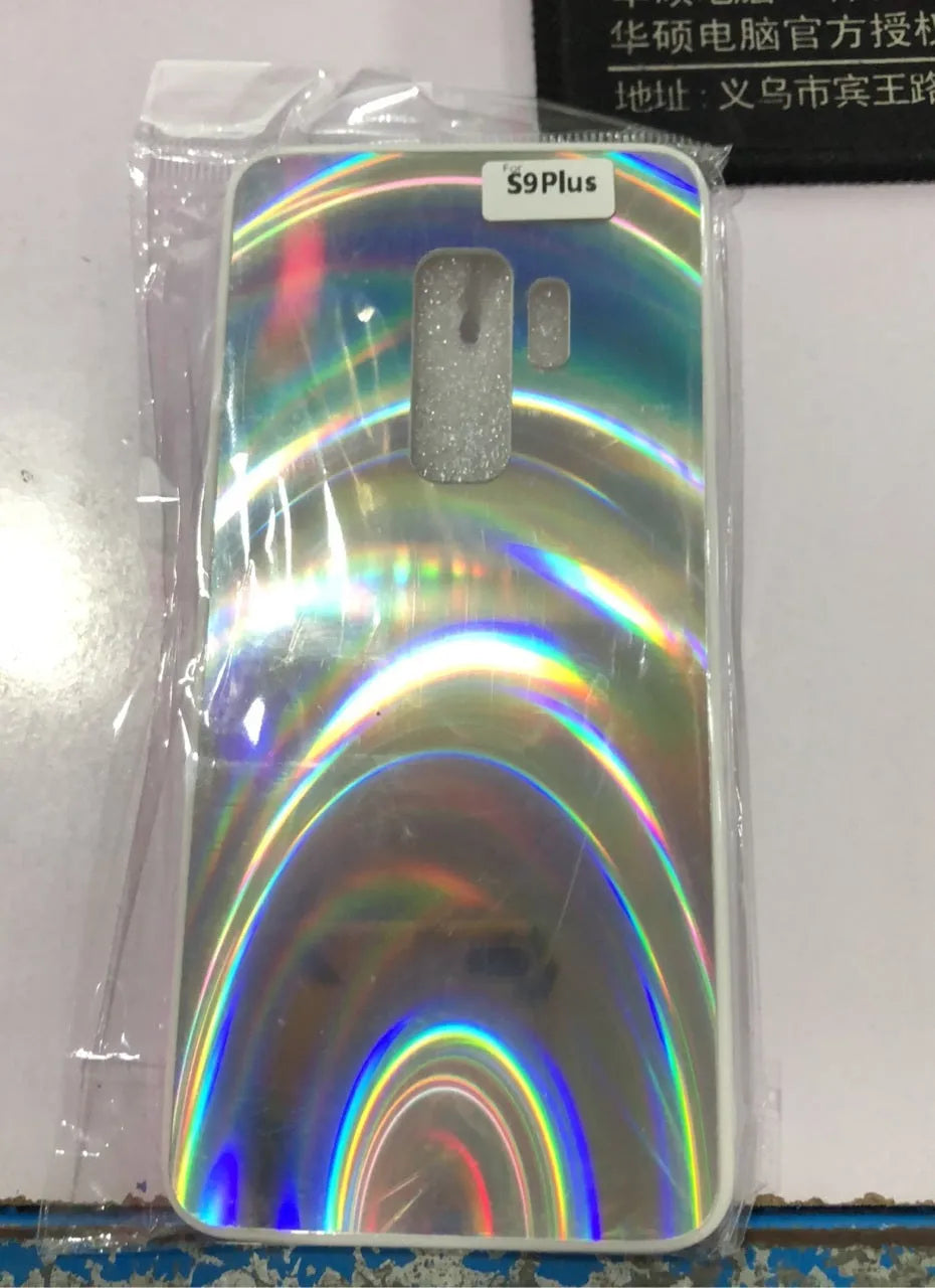 A 3D rainbow glitter gradient back cover case for a smartphone, showing its full-coverage design and sparkling finish.