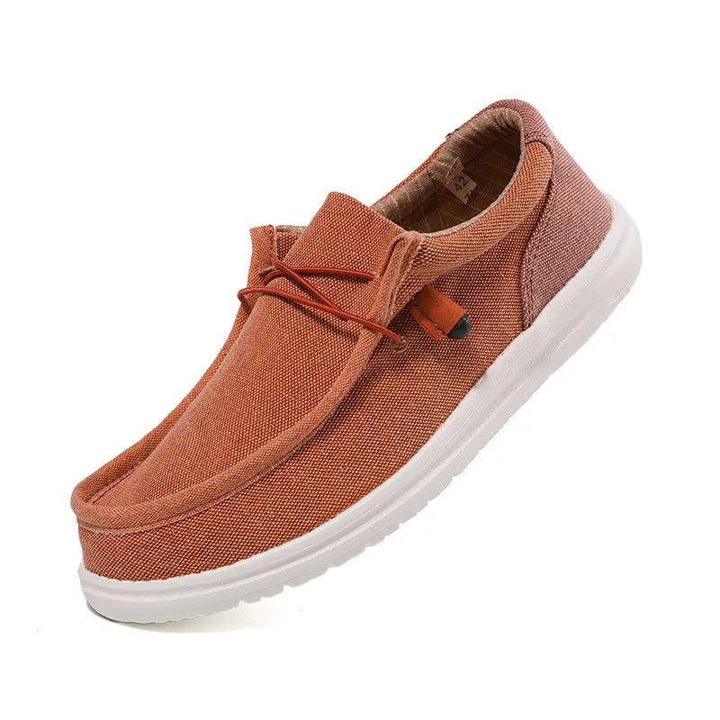 Men's casual canvas shoes with mosaic pattern on green upper and rubber sole