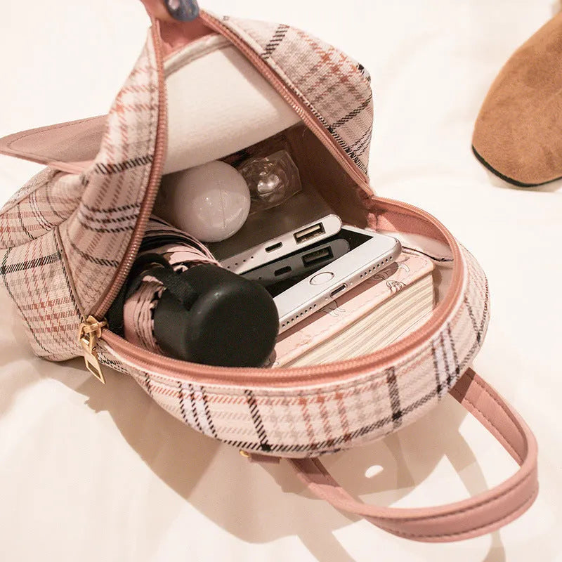 Diagonal phone bag in PU leather available in five colours for shoulder or handheld carrying