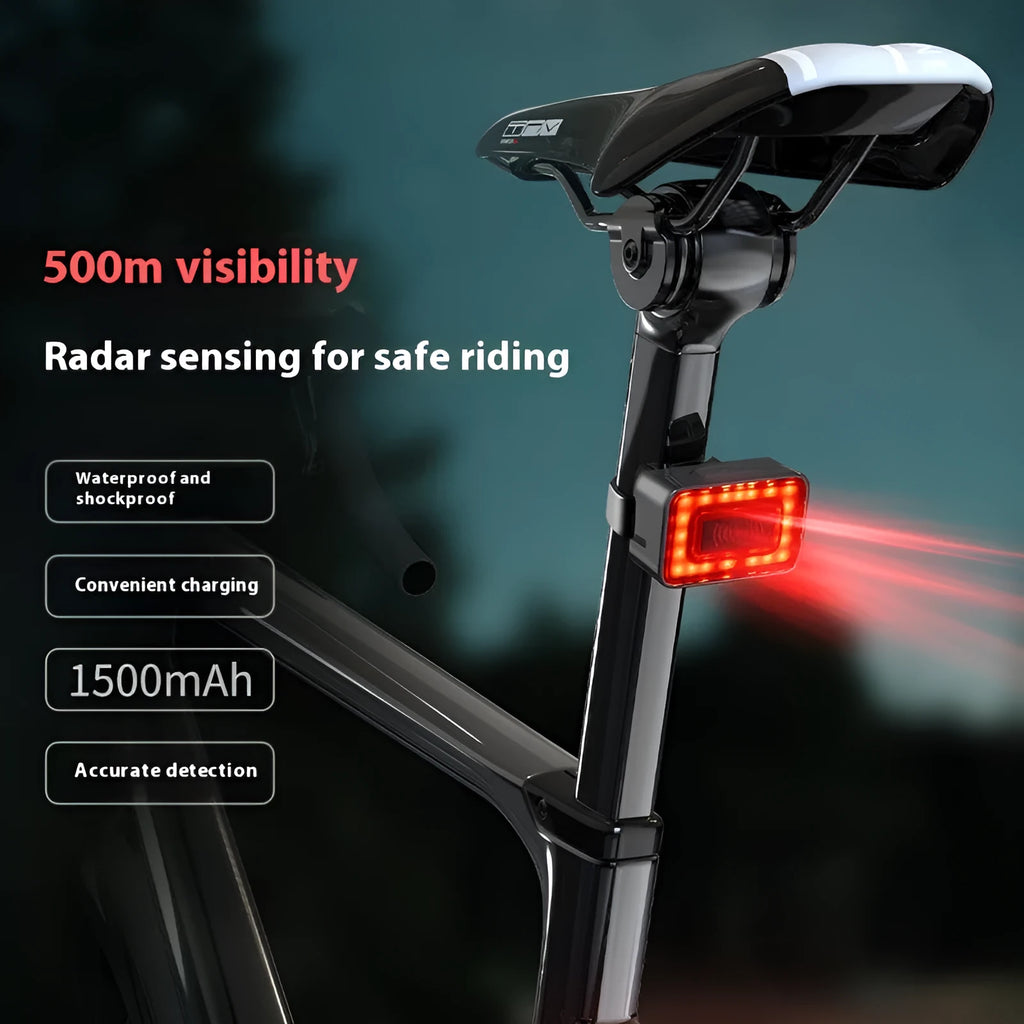 Smart radar bicycle taillight with double mounting bracket on a bike seat post, showing compact black design.