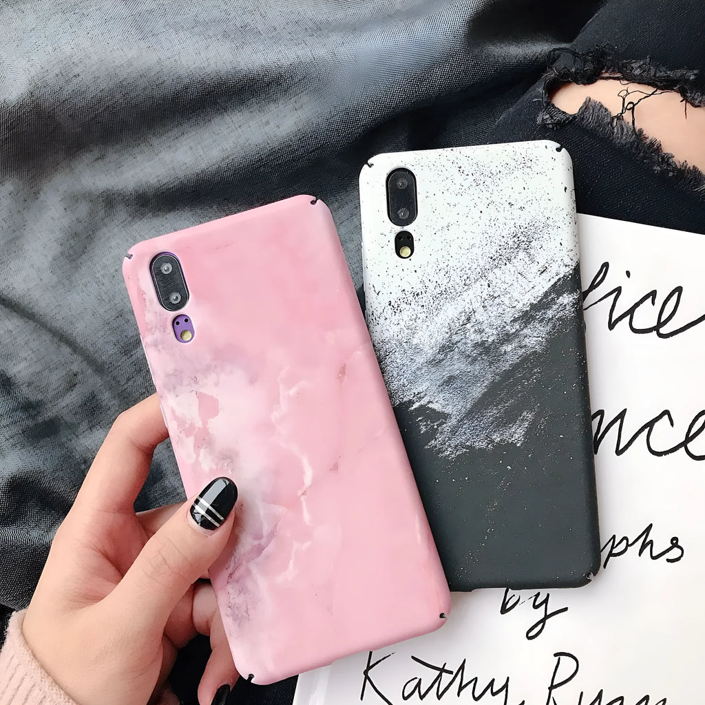 Solid colour painted phone case for Huawei and Honor smartphones in black and pink options.